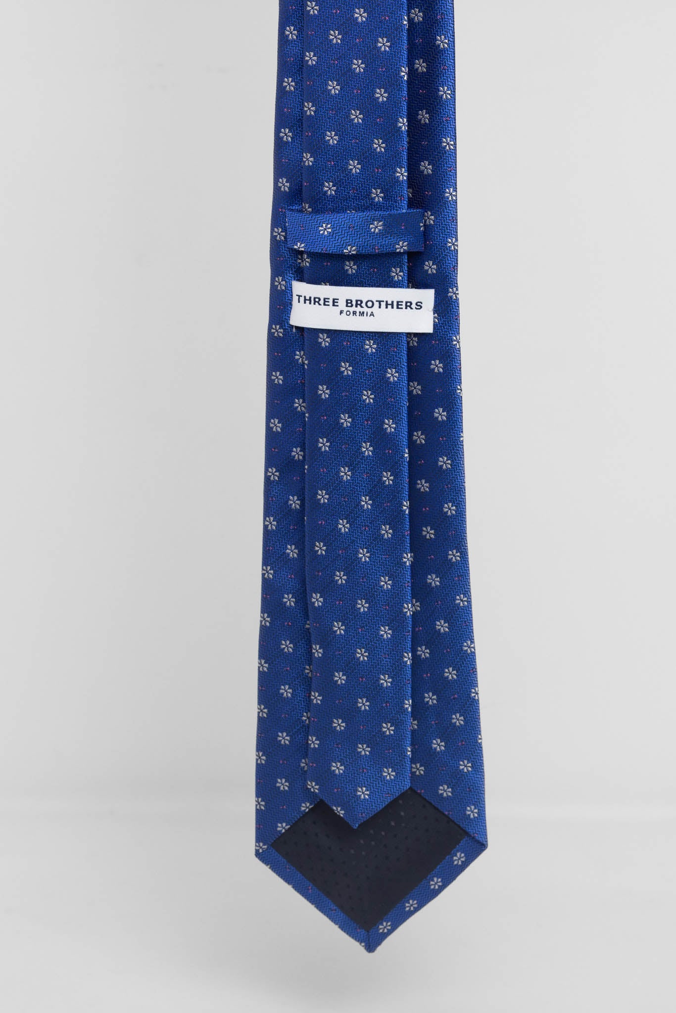 Cravatta Tre Pieghe Fantasia Fiorellini e Pois Fondo Azzurro e Bianco | 2 Per €20