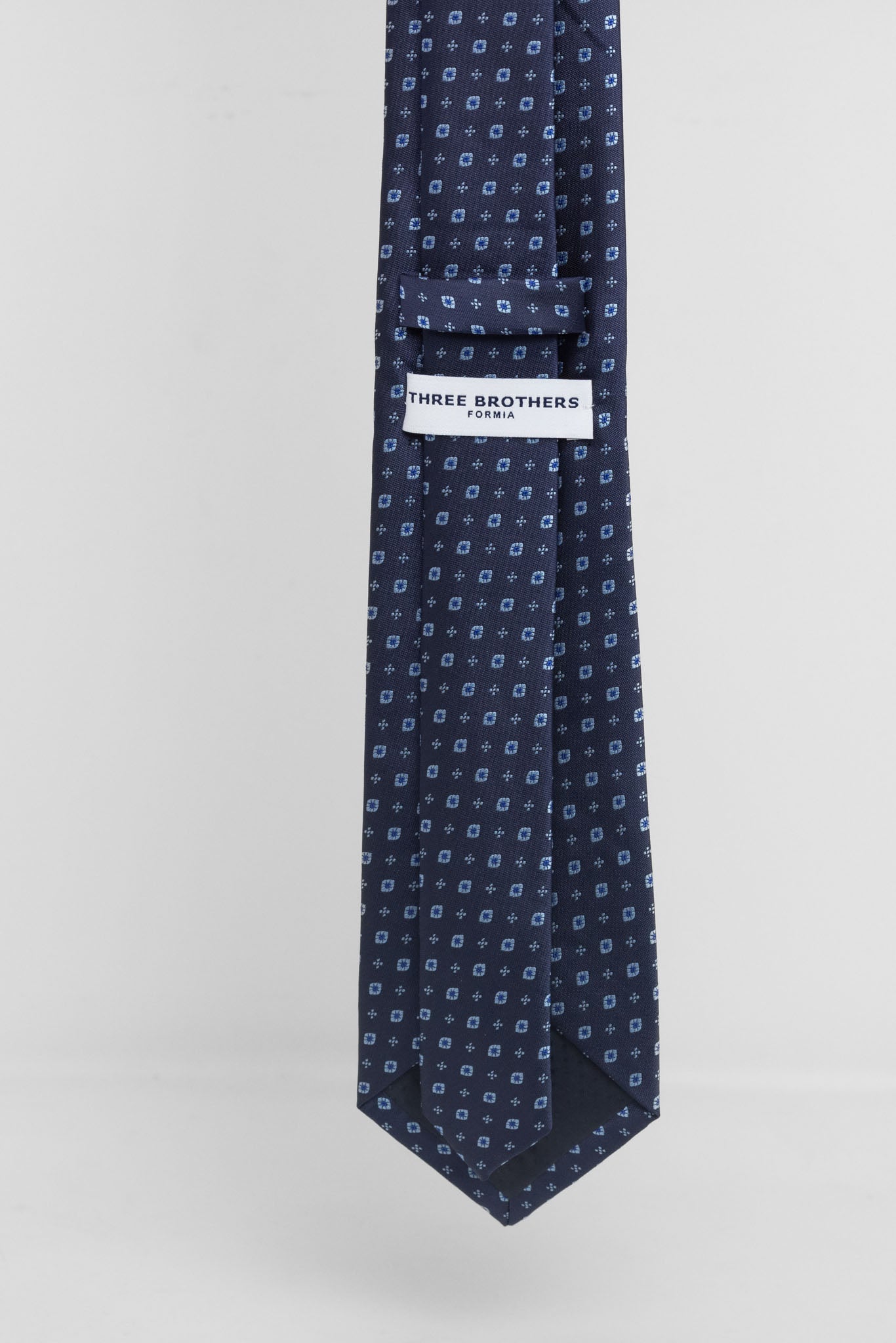 Cravatta Tre Pieghe Fantasia Astratta Celeste su Fondo Blu | 2 Per €20