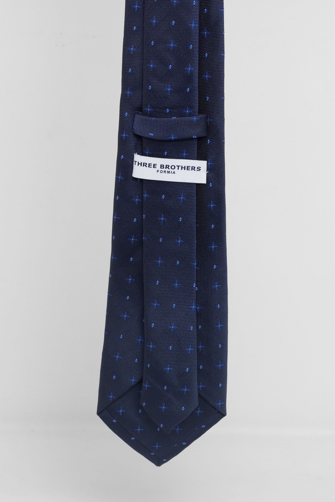 Cravatta Tre Pieghe Fantasia Unica Fondo Blu Crocette Celesti | 2 Per €20